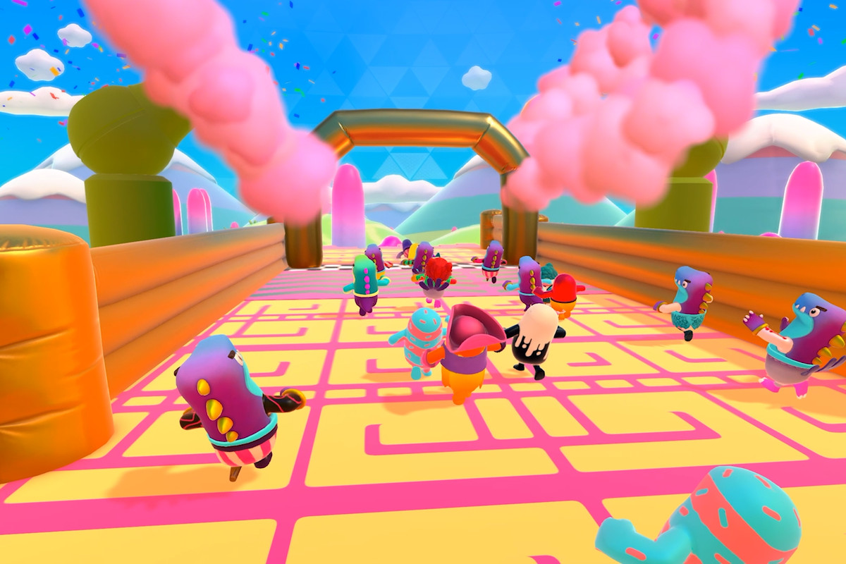 A colorful swarm of jelly bean-shaped guys run towards an exit