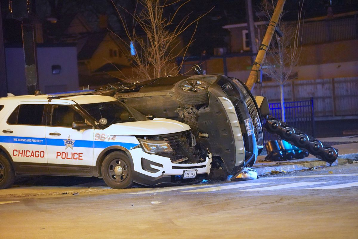 The wreckage of a crash Dec. 18, 2019, between a Chicago police cruiser and a Kia sedan at Lawrence and Central avenues in Jefferson Park. A confidential report showed that 66% of police chases in 2019 ended in crashes.