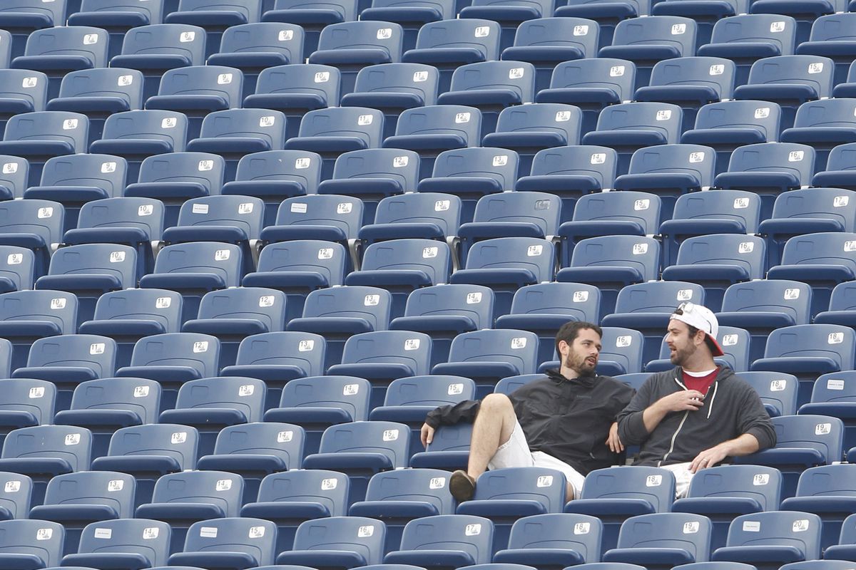 These two fans are excited to watch the Minutemen take on Miami this week in the cavernous, echoy, ghost town of a stadium that is Gillette Stadium on Saturdays.