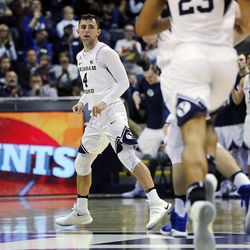 Brigham Young Cougars guard Nick Emery (4) hits a 3-pointer against Colorado during an NCAA basketball game in Provo on Saturday, Dec. 10, 2016.