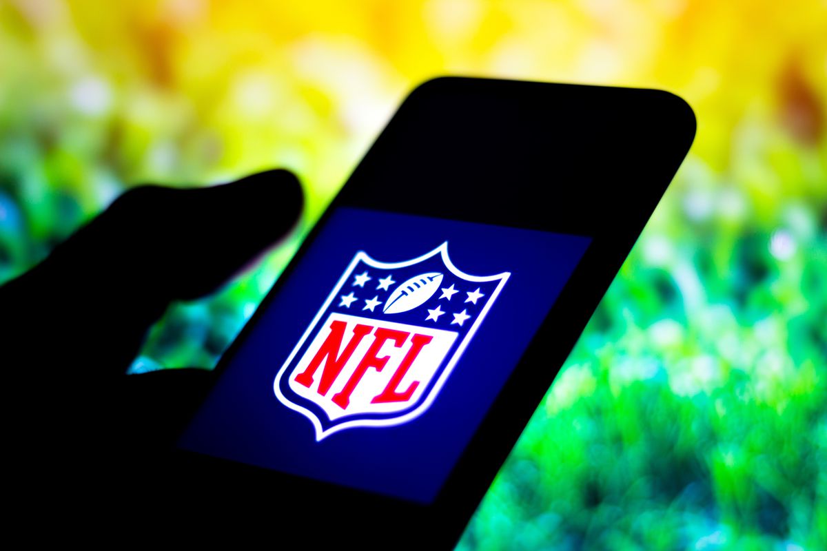 In this photo illustration the NFL (National Football League...
