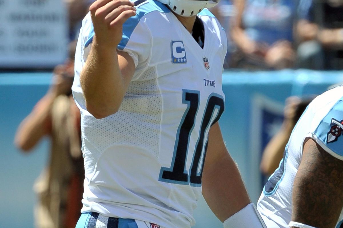 Sep 9, 2012; Nashville, TN, USA; Tennessee Titans quarterback Jake Locker (10) signals to his team against the New England Patriots during the first half at LP Field. Mandatory Credit: Jim Brown-US PRESSWIRE