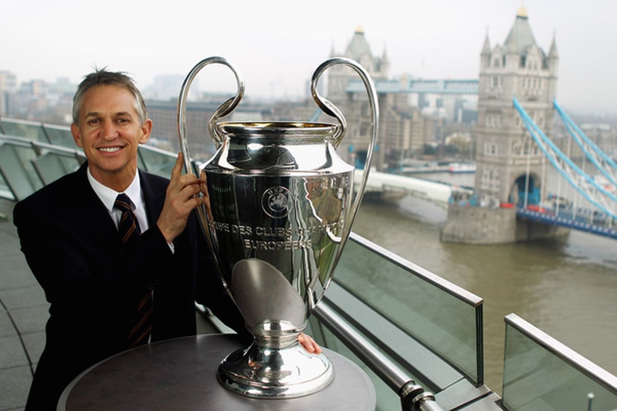 2011 Champions League Final ambassador Gary Lineker poses with the Champions League Trophy.