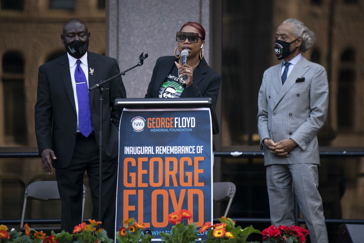George Floyd’s sister, Bridgett Floyd, addresses a rally in downtown Minneapolis, Sunday, May 23, 2021. At left is attorney Ben Crump. At right is the Rev. Al Sharpton. “It has been a long year. It has been a painful year,” Floyd’s sister Bridgett told the crowd on Sunday.