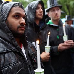 Lorin Ward attends a vigil for the victims and survivors of the mass shooting at a gay nightclub in Orlando, Florida, outside of the Salt Lake City-County Building on Monday, June 13, 2016.