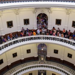 A line to enter the Senate Chamber spills into the rotunda as Sen. Wendy Davis, D-Fort Worth, filibusters in an effort to kill an abortion bill, Tuesday, June 25, 2013, in Austin, Texas. The bill would ban abortion after 20 weeks of pregnancy and force many clinics that perform the procedure to upgrade their facilities and be classified as ambulatory surgical centers.  (AP Photo/Eric Gay)