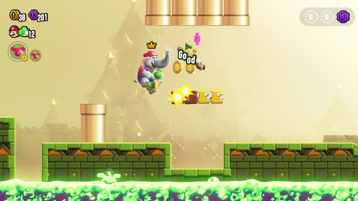 Elephant Mario rides on the back of a Yoshi in a screenshot from Super Mario Bros. Wonder