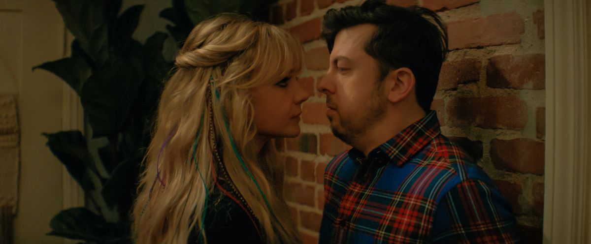 Carey Mulligan pushes Christopher Mintz-Plasse against a wall in PROMISING YOUNG WOMAN