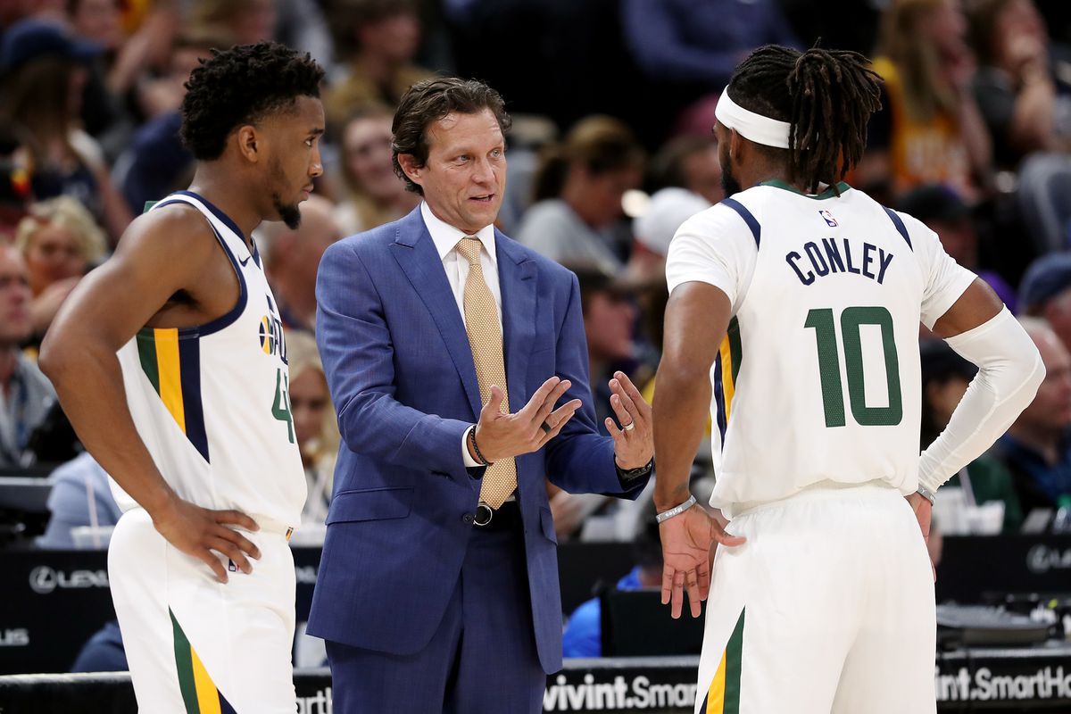 Utah Jazz coach Quin Snyder talks with Utah Jazz guard Donovan Mitchell (45) and Utah Jazz guard Mike Conley (10) as the Utah Jazz and the Portland Trail Blazers play at Vivint Smart Home Arena in Salt Lake City on Wednesday, Oct. 16, 2019.