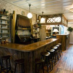  When you step into <a href="http://ny.eater.com/places/vinegar-hill-house">Vinegar Hill House</a>, you feel like you're in a different time and a different place that you can't quite pinpoint.  It's homey, just a tad funky, and completely American.  A lo