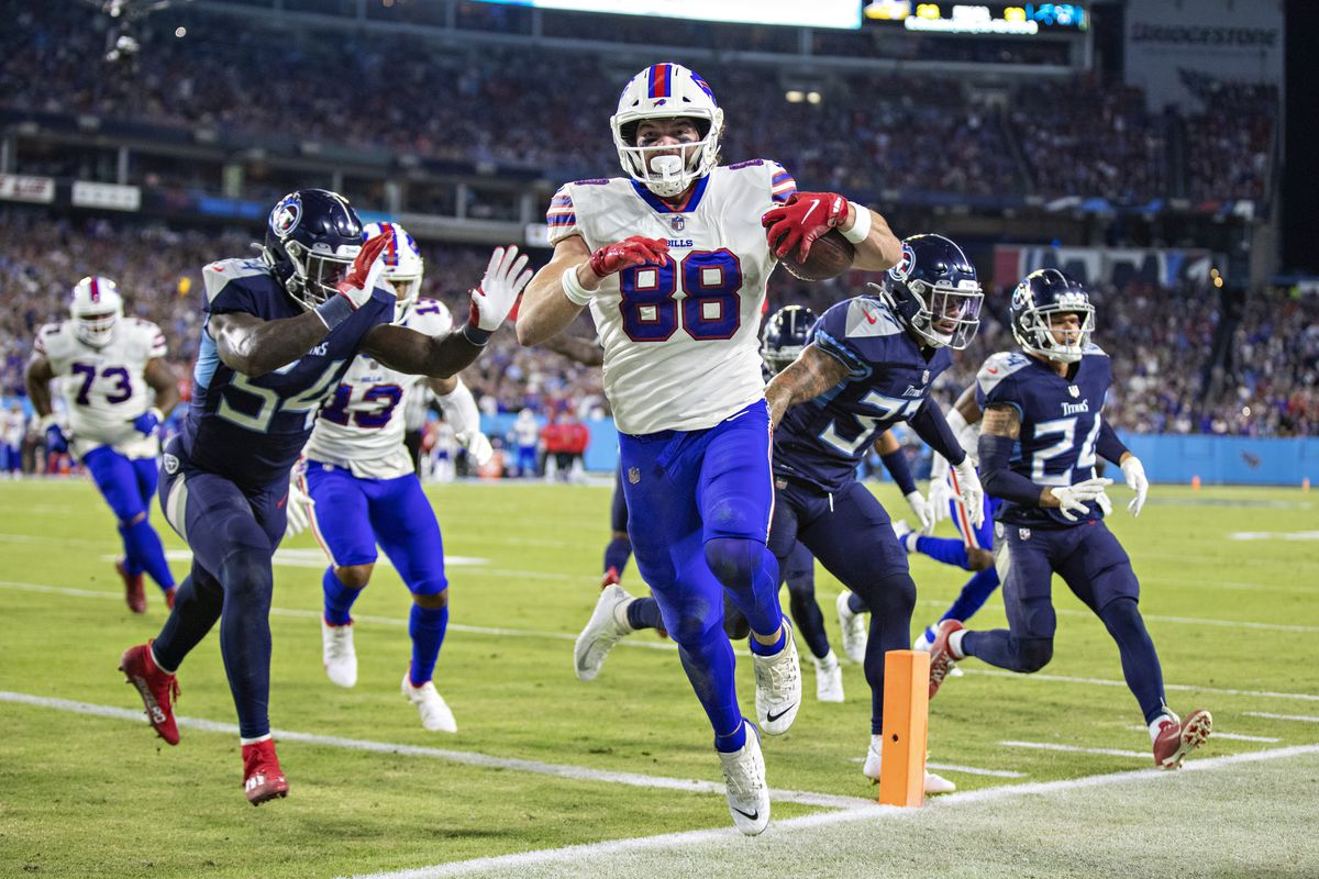 Dawson Knox #88 of the Buffalo Bills runs the ball in for a touchdown that is called back by a penalty during a game against the Tennessee Titans at Nissan Stadium on October 18, 2021 in Nashville, Tennessee. The Titans defeated the Bills 34-31.