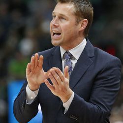 Sacramento Kings coach David Joerger shouts to his team during the second half of an NBA basketball game against the Utah Jazz on Saturday, March 17, 2018, in Salt Lake City. (AP Photo/Rick Bowmer)