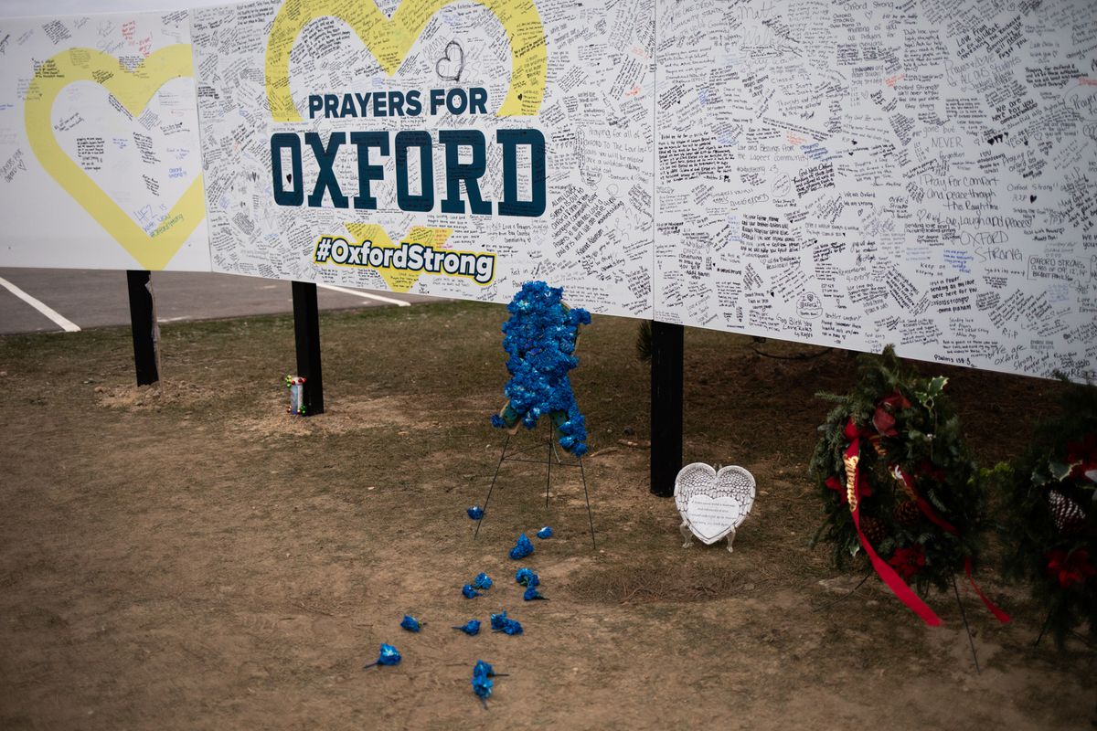 A board where community members can share words of support alongside the memorial outside of Oxford High School on December 7, 2021 in Oxford, Michigan. One week ago, four students were killed and seven others injured on November 30, when student Ethan Crumbley allegedly opened fire with a pistol at the school. 15-year-old Ethan Crumbley has been charged along with his parents James and Jennifer Crumbley who have been charged with four counts of involuntary manslaughter 