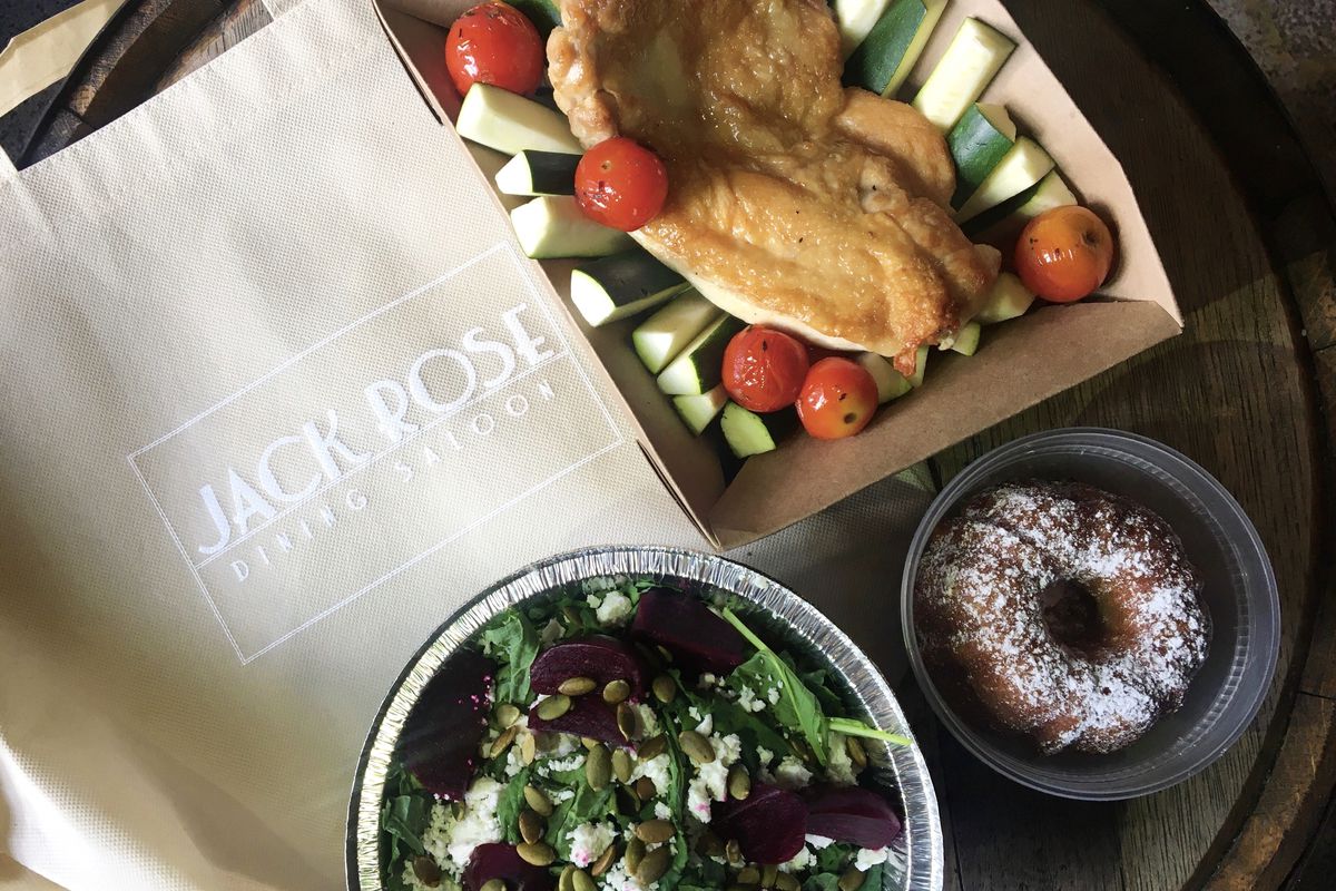 Jack Rose’s new to-go dinner for two features roasted Amish chicken, baby kale and beet salad, and butter cake ($40).