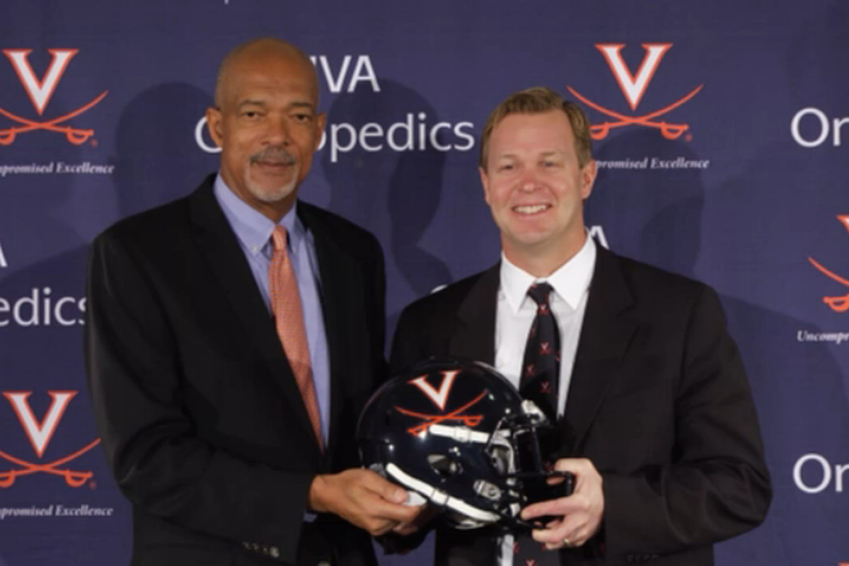 UVA athletic director Craig Littlepage and Bronco Mendenhall at his introductory press conference, Dec. 7, 2015.
