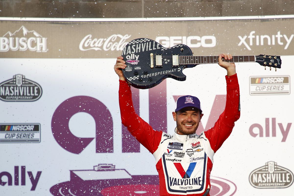Kyle Larson, driver of the Valvoline Chevrolet, celebrates in victory lane after winning the NASCAR Cup Series Ally 400 at Nashville Superspeedway on June 20, 2021 in Lebanon, Tennessee.