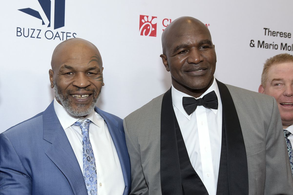 Former rivals Mike Tyson and Evander Holyfield at a gala in 2019. 
