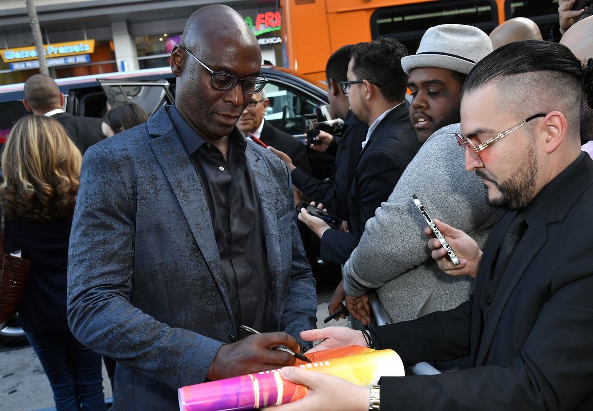 Lance Reddick signs autographs for fans outside the TCL Chinese Theatre in Los Angeles at a screening of 2019’s John Wick: Chapter 3 – Parabellum