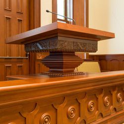 This pulpit was found completely intact following the tabernacle fire and was placed in the chapel of the Provo City Center Temple.