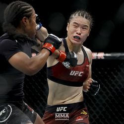 Zhang Weili lands a right at UFC 227.