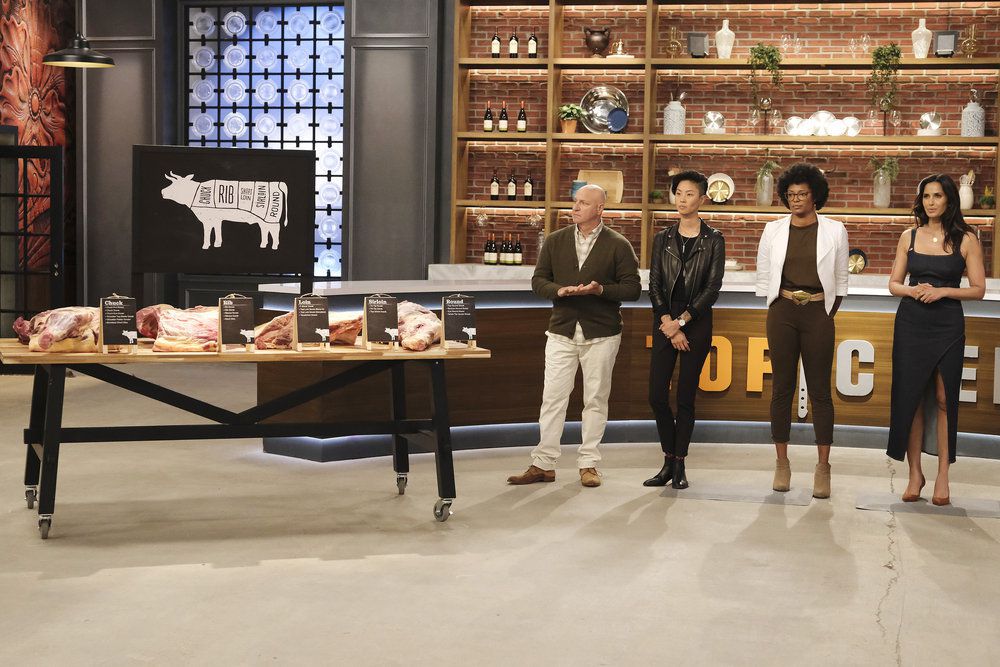 ‘Top Chef: Houston’ judges Tom Colicchio, Kristen Kish, Dawn Burrell, and host Padma Lakshmi introduce contestants to beef challenge with a counter of different cuts.