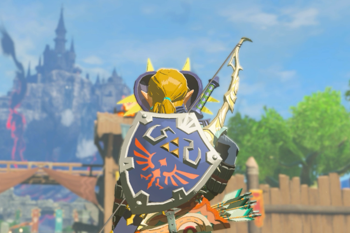Link wearing the Hylian Shield on his back with Hyrule Castle in the background in The Legend of Zelda: Tears of the Kingdom
