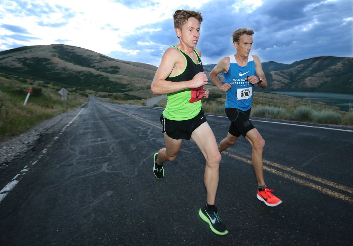 Jon Kotter, left, and Fritz Van de Kamp compete in the Deseret News Marathon in East Canyon on Monday, July 24, 2017.
