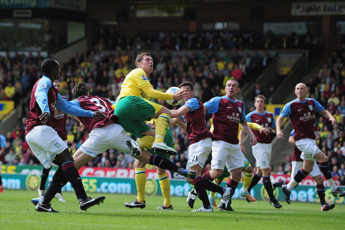 NORWICH, ENGLAND - MAY 13:  Grant Holt of Norwich City scores his goal during the Barclays Premier Leage match between Norwich City and Aston Villa at Carrow Road on May 13, 2012 in Norwich, England.  (Photo by Jamie McDonald/Getty Images)