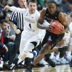 Brigham Young Cougars guard Nick Emery (4) and Santa Clara Broncos guard Jared Brownridge (23) try to control the ball during the WCC tournament in Las Vegas Saturday, March 5, 2016. BYU won 72-60. 