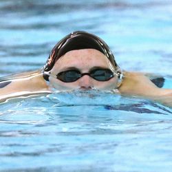 A swimmer competes during the 6A boys swim championship at Kearns Oquirrh Park Fitness Center in Kearns on Saturday, Feb. 20, 2021.
