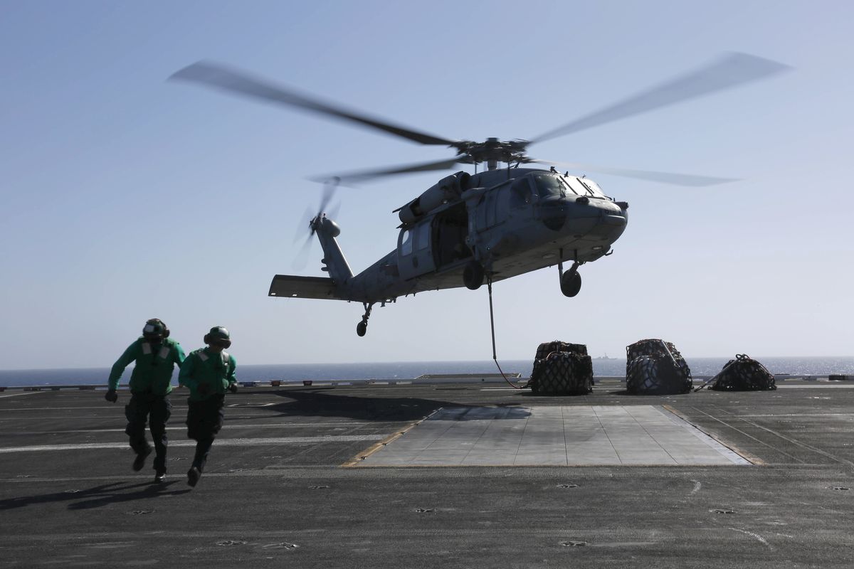 US Navy sailors on the&nbsp;flight deck of USS Abraham Lincoln on May 10, 2019 in the Red Sea.