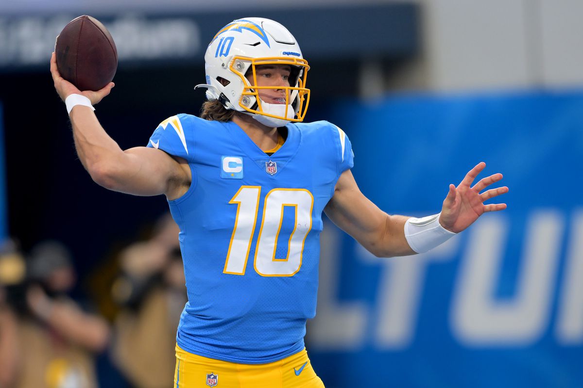 Los Angeles Chargers quarterback Justin Herbert (10) looks to throw a pass in the first half the game against the Denver Broncos at SoFi Stadium.
