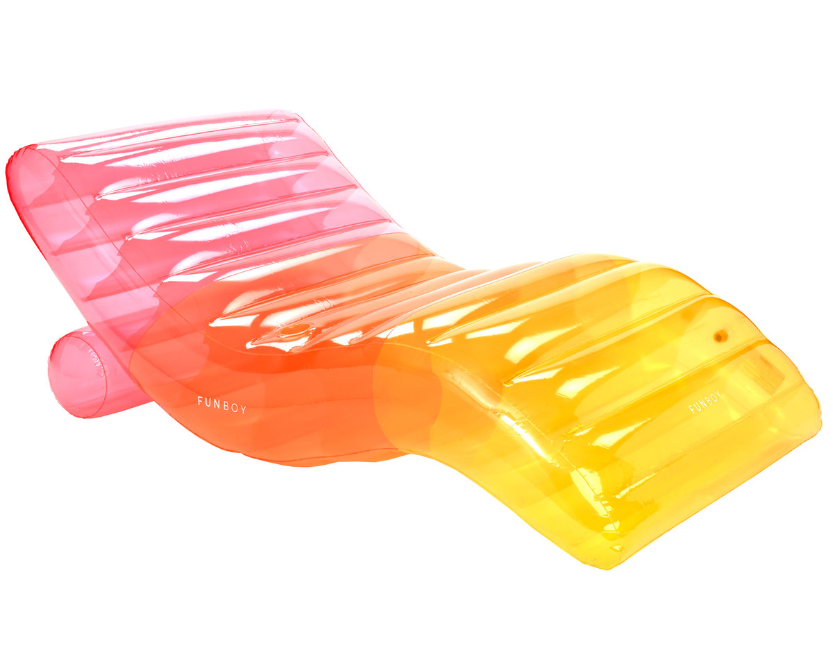 A Funboy inflatable chaise lounger for a swimming pool. The lounger is pink, yellow, and orange.