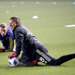 Nick Rimando stretches during practice with Real Salt Lake at the Real Salt Lake Academy and Training Facility in Herriman on Tuesday, Jan. 23, 2018.