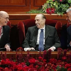 President Thomas S. Monson, President Henry B. Eyring and President Dieter F. Uchtdorf talk prior to the General Women's Session at the Conference Center in Salt Lake City on Saturday, March 26, 2016. 
