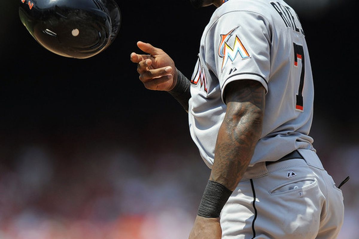 July 8, 2012; St. Louis, MO. USA; Miami Marlins shortstop Jose Reyes (7) tosses his helmet after flying out to St. Louis Cardinals center fielder Jon Jay (not pictured) in the fifth inning at Busch Stadium. Mandatory Credit: Jeff Curry-US PRESSWIRE