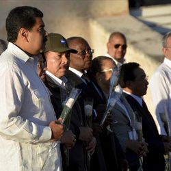 Venezuela's President Nicolas Maduro, left, and Nicaragua's President Daniel Ortega attend the burial ceremony of the ashes of the late Fidel Castro at the Santa Ifigenia cemetery in Santiago, Cuba, Sunday Dec.4, 2016.