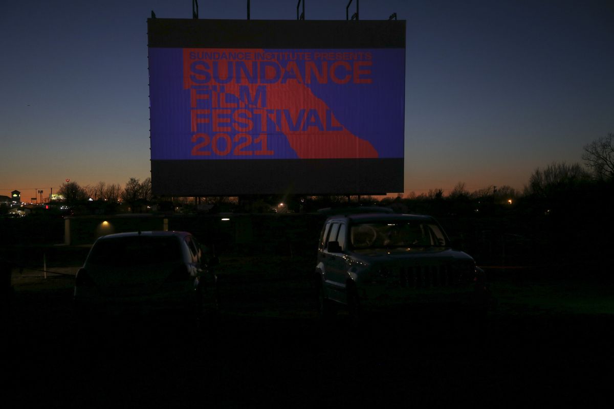 Spectators watch a 2021 Sundance Film Festival film at Admiral Twin Drive-In in Tulsa, Okla., on Tuesday, Feb. 2, 2021.
