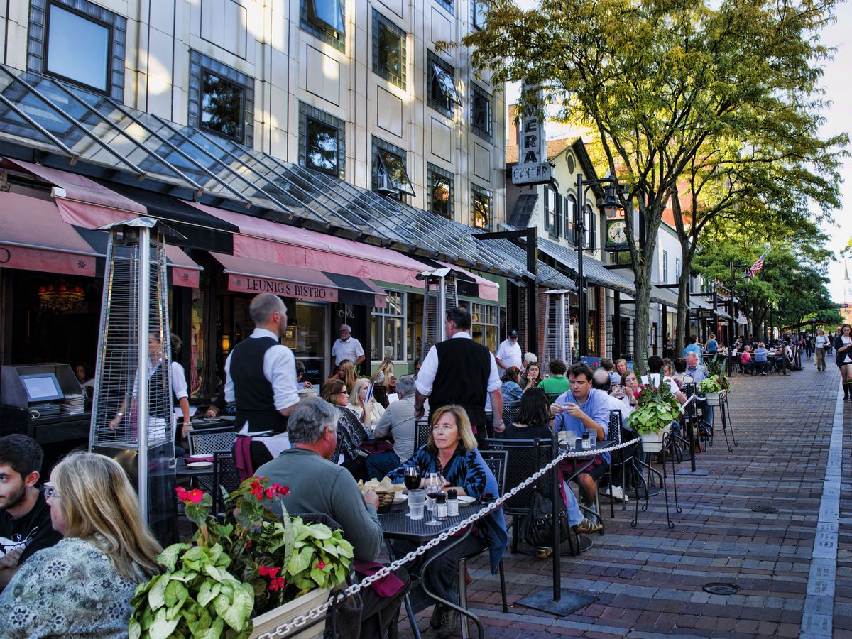 Diners at outdoor patio tables.