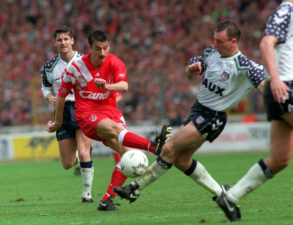 Football. 1992 FA Cup Final. Wembley. 9th May, 1992. Liverpool 2 v Sunderland 0. Liverpool’s Ian Rush shoots past the challenge of Sunderland’s Kevin Ball.