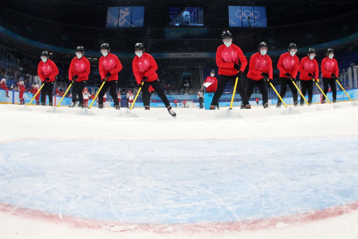 A worker resurfaces the ice during the men’s preliminary round group B match of the Beijing 2022 Winter Olympic Games ice hockey competition between Czech Republic and Denmark, at the National Indoor Stadium in Beijing on February 9, 2022
