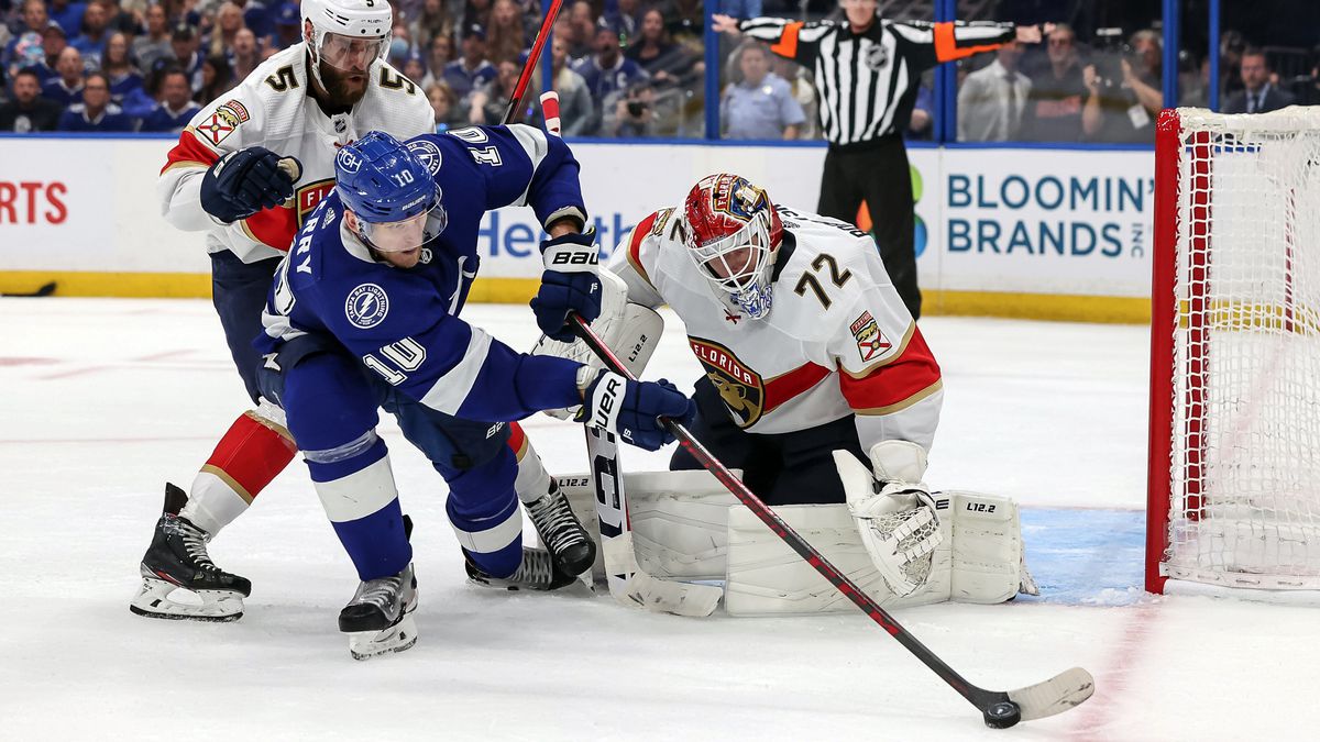 Corey Perry #10 of the Tampa Bay Lightning reaches for a rebound from Sergei Bobrovsky #72 of the Florida Panthers as Aaron Ekblad #5 defends during the second period in Game Three of the Second Round of the 2022 Stanley Cup Playoffs at Amalie Arena on May 22, 2022 in Tampa, Florida.