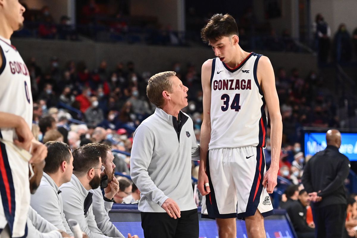 Gonzaga Bulldogs center Chet Holmgren (34) talks with Gonzaga Bulldogs head coach Mark Few during a game against the Pacific Tigers in the second half at McCarthey Athletic Center.
