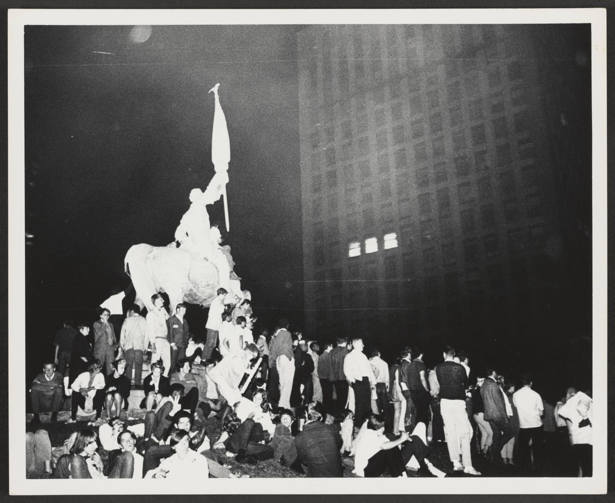 1968 protesters gather around the statue of Civil War general John A. Logan, the centerpiece of days of protest. | Chicago Park District Archives, Chicago Public Library