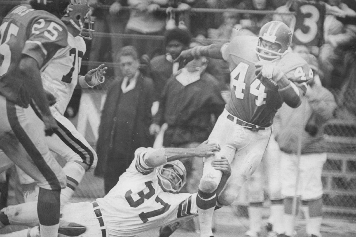 SEP 14 1973, SEP 17 1973; Denver Broncos (Action); Bronco Floyd Little, with Cincinnati Safety Tommy