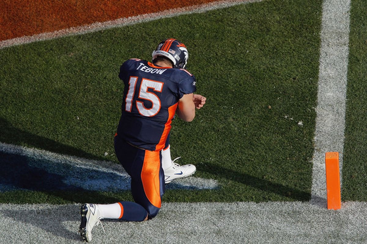 DENVER - DECEMBER 26:  Tim Tebow #15 of the Denver Broncos prays in the end zone prior to taking on the Houston Texans at INVESCO Field at Mile High on December 26 2010 in Denver Colorado. (Photo by Justin Edmonds/Getty Images)
