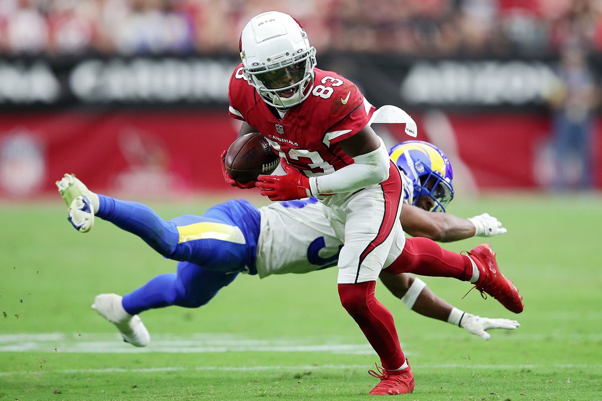 GLENDALE, ARIZONA - SEPTEMBER 25: Wide receiver Greg Dortch #83 of the Arizona Cardinals gets past cornerback Grant Haley #36 of the Los Angeles Rams in the third quarter of the game at State Farm Stadium on September 25, 2022 in Glendale, Arizona.