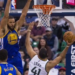 Golden State center JaVale McGee (1) contests a shot by Utah forward Trey Lyles (41) during the second half of an NBA basketball game in Salt Lake City on Thursday, Dec. 8, 2016. Golden State defeated Utah with a final score of 106-99.