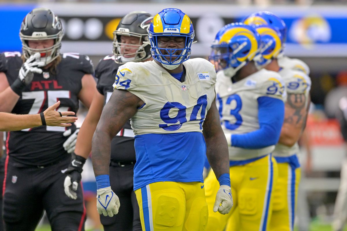 Los Angeles Rams defensive tackle A’Shawn Robinson (94) celebrates after stopping Atlanta Falcons running back Caleb Huntley (not pictured) short of a first down in the first half at SoFi Stadium.