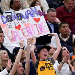 Fans hold up a sign for Utah Jazz guard Donovan Mitchell (45) during a basketball game against the Phoenix Suns at the Vivint Smart Home Arena in Salt Lake City on Wednesday, Feb. 14, 2018. Jazz won 107-97.